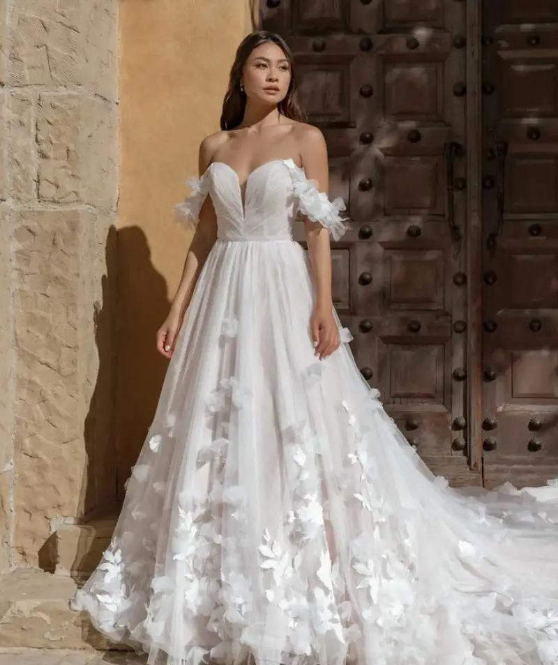 Models wearing a bridal dress